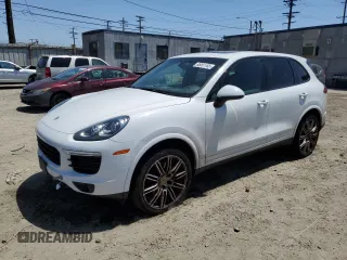 2018 Porsche Cayenne z VIN WP1AA2A29JKA01259, wystawiony jako Copart lot #55061165 z przebiegiem 100 451 mil mil oraz Tytuł czysty. Historia ofert i sprzedaży dostępna na DreamBid. Obrazek 1.