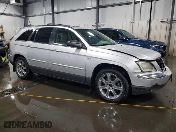 2005 Chrysler Pacifica Touring with VIN 2C4GM68425R368366, listed as a Copart auction lot 54777675 with 122,521 mi miles and Salvage Title. Bid and sale history available at DreamBid. Image 4.