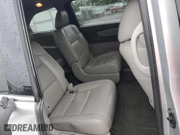 2011 Honda Odyssey Touring with VIN 5FNRL5H99BB021223, listed as a Copart auction lot 61171775 with 194,029 mi miles and Salvage title. Bid and sale history available at DreamBid. Image 11.