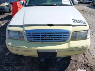 1999 Ford Crown Victoria Police with VIN 2FAFP71WXXX239705, listed as a IAAI auction lot 41601390 with 161,454 mi miles. Bid and sale history available at carsss.com. Image 6.