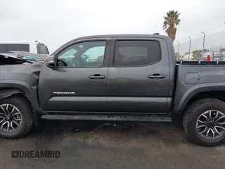 2020 Toyota Tacoma SR5 z VIN 3TMCZ5AN6LM323920, wystawiony jako IAAI lot #41885427 z przebiegiem 153 952 mil mil oraz . Historia ofert i sprzedaży dostępna na DreamBid. Obrazek 14.