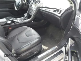 2016 Ford Fusion Titanium with VIN 3FA6P0K9XGR193744, listed as a IAAI auction lot 41839086 with 145,463 mi miles. Bid and sale history available at carsss.com. Image 5.