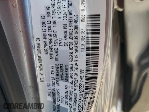 2014 Mazda CX-5 Touring z VIN JM3KE2CY0E0412733, wystawiony jako Copart lot #55803865 z przebiegiem 161 539 mil mil oraz Szkoda całkowita • Salvage title. Historia ofert i sprzedaży dostępna na DreamBid. Obrazek 13.