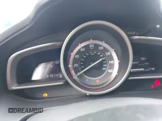 2014 Mazda 3 i Touring z VIN JM1BM1L73E1100378, wystawiony jako IAAI lot #42069396 z przebiegiem 91 973 mil mil oraz . Historia ofert i sprzedaży dostępna na DreamBid. Obrazek 7.