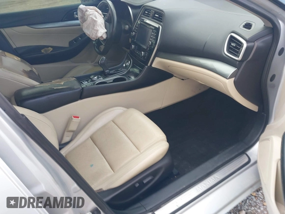 2016 Nissan Maxima SV with VIN 1N4AA6AP7GC439288, listed as a IAAI auction lot 41572262 with 223,185 mi miles and . Bid and sale history available at DreamBid. Image 5.