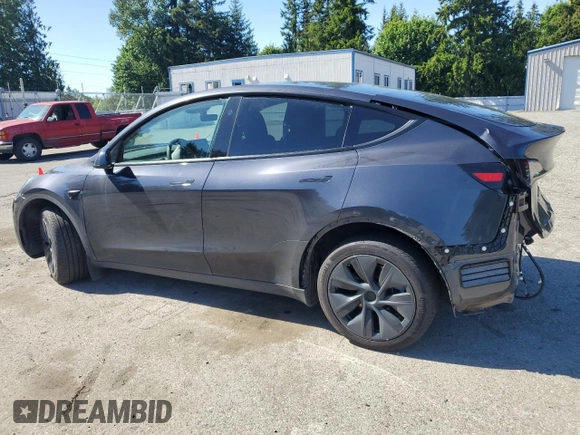 2024 Tesla Model Y Long Range with VIN 7SAYGDEE9RF120729, listed as a Copart auction lot 57360265 with 21,589 mi miles and Salvage title. Bid and sale history available at DreamBid. Image 2.