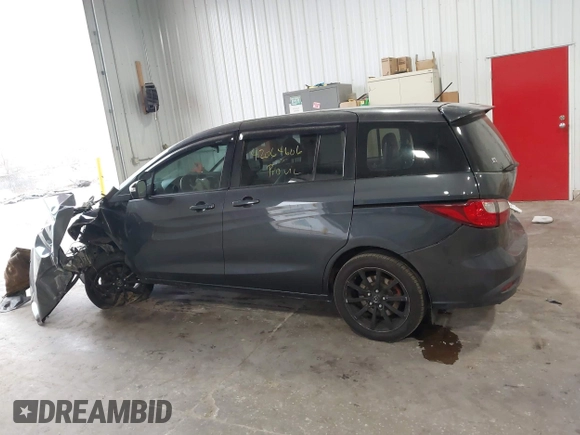 2014 Mazda 5 Sport z VIN JM1CW2BLXE0164748, wystawiony jako IAAI lot #42064606 z przebiegiem 140 169 mil mil oraz . Historia ofert i sprzedaży dostępna na DreamBid. Obrazek 14.