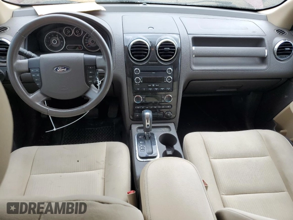 2008 Ford Taurus X SEL с VIN 1FMDK02W38GA32873, выставлен на аукционе Copart как лот 61338115 с пробегом 192 806 миль миль и Чистый • Clean title. История ставок и продаж доступна на DreamBid. Изображение 8.