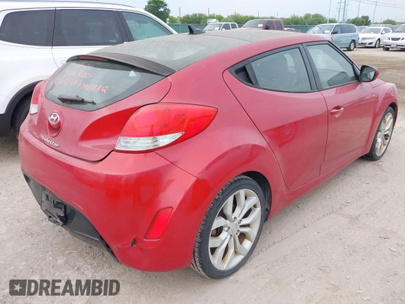 2013 Hyundai Veloster w/Gray Int with VIN KMHTC6AD2DU141462, listed as a IAAI auction lot 42136445 with 122,146 mi miles and . Bid and sale history available at DreamBid. Image 4.