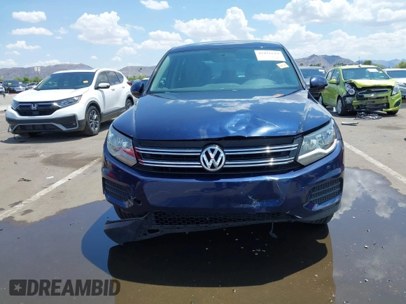 2013 Volkswagen Tiguan with VIN WVGCV3AX6DW605876, listed as a IAAI auction lot 42431619 with 106,279 mi miles and . Bid and sale history available at DreamBid. Image 6.