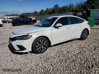 2024 Honda Civic Hatchback EX-L with VIN 19XFL1H75RE016109, listed as a Copart auction lot 80801544 with 9,395 mi miles and Clean Title. Bid and sale history available at carsss.com. Image 1.