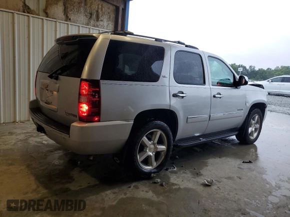 2012 Chevrolet Tahoe LTZ с VIN 1GNSKCE04CR272829, выставлен на аукционе Copart как лот 59959525 с пробегом 164 690 миль миль и Списание • Salvage title. История ставок и продаж доступна на DreamBid. Изображение 3.
