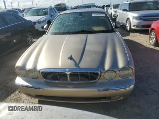 2005 Jaguar XJ with VIN SAJWA79C05SG46913, listed as a Copart auction lot 75092794 with 0 mi miles and Salvage Title. Bid and sale history available at carsss.com. Image 5.