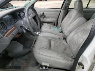 2003 Ford Crown Victoria LX with VIN 2FAFP74W03X158931, listed as a Copart auction lot 71588824 with 165,074 mi miles and Salvage Title. Bid and sale history available at carsss.com. Image 7.