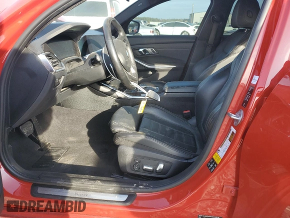 2019 BMW 3 Series 330i xDrive with VIN WBA5R7C51KAJ82278, listed as a Copart auction lot 82415124 with 57,625 mi miles and Salvage Title. Bid and sale history available at carsss.com. Image 7.