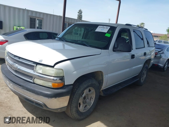 2004 Chevrolet Tahoe LS with VIN 1GNEC13V24J290596, listed as a IAAI auction lot 41956638 with 199,004 mi miles. Bid and sale history available at carsss.com. Image 2.