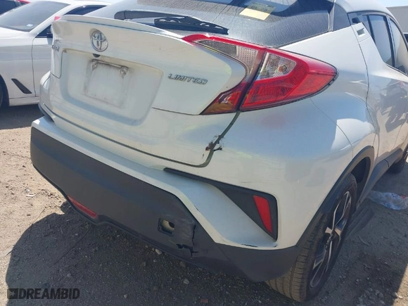 2019 Toyota C-HR XLE with VIN JTNKHMBX7K1023674, listed as a IAAI auction lot 42021152 with 106,450 mi miles. Bid and sale history available at carsss.com. Image 17.