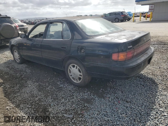 1994 Toyota Camry XLE with VIN JT2GK13E0R0012242, listed as a Copart auction lot 50966775 with 70,922 mi miles and Salvage Title. Bid and sale history available at carsss.com. Image 2.