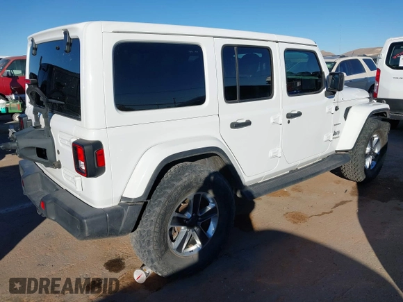 2019 Jeep Wrangler Unlimited Sahara с VIN 1C4HJXEN9KW509839, выставлен на аукционе IAAI как лот 41054085 с пробегом 78 850 миль миль и . История ставок и продаж доступна на DreamBid. Изображение 4.