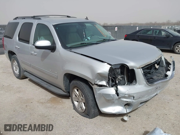 2014 GMC Yukon SLT with VIN 1GKS1CE02ER204452, listed as a IAAI auction lot 41804400 with 176,265 mi miles. Bid and sale history available at carsss.com. Image 1.