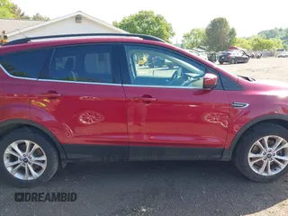 2018 Ford Escape SE z VIN 1FMCU9GD8JUB33366, wystawiony jako IAAI lot #42264706 z przebiegiem 48 478 mil mil oraz . Historia ofert i sprzedaży dostępna na DreamBid. Obrazek 14.