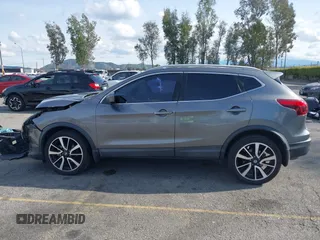 2017 Nissan Rogue S z VIN JN1BJ1CP1HW002968, wystawiony jako IAAI lot #41896777 z przebiegiem 128 583 mil mil oraz . Historia ofert i sprzedaży dostępna na DreamBid. Obrazek 14.