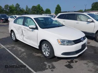 2013 Volkswagen Jetta SE z VIN 3VWDP7AJ2DM421232, wystawiony jako IAAI lot #42377946 z przebiegiem 160 796 mil mil oraz . Historia ofert i sprzedaży dostępna na DreamBid. Obrazek 1.