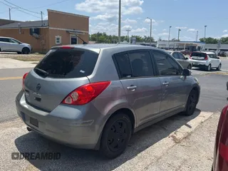 2009 Nissan Versa S with VIN 3N1BC13E19L499018, listed as a Copart auction lot 56711385 with 196,451 mi miles and Clean Title. Bid and sale history available at DreamBid. Image 4.