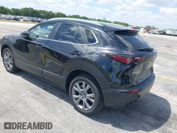 2025 Mazda CX-30 S Preferred with VIN 3MVDMBCM0SM798708, listed as a IAAI auction lot 42133091 with 4,305 mi miles and . Bid and sale history available at DreamBid. Image 3.