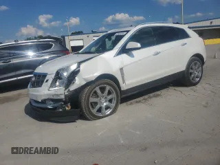 2012 Cadillac SRX Premium Collection with VIN 3GYFNCE34CS652580, listed as a Copart auction lot 63432395 with 128,718 mi miles and Salvage title. Bid and sale history available at DreamBid. Image 1.