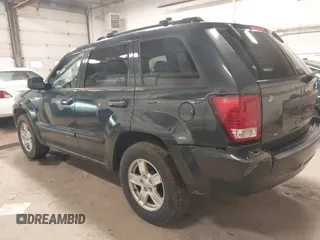 2007 Jeep Grand Cherokee Laredo with VIN 1J8GS48K87C615693, listed as a IAAI auction lot 41949521 with 206,058 mi miles. Bid and sale history available at carsss.com. Image 3.