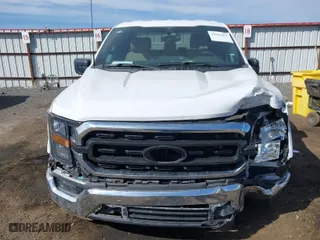 2023 Ford F-150 XL with VIN 1FTEW1C51PKE77973, listed as a IAAI auction lot 42034951 with 39,465 mi miles. Bid and sale history available at carsss.com. Image 12.