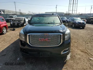 2016 GMC Yukon Denali with VIN 1GKS2CKJ9GR301628, listed as a Copart auction lot 48937035 with 121,863 mi miles and Salvage Title. Bid and sale history available at carsss.com. Image 5.
