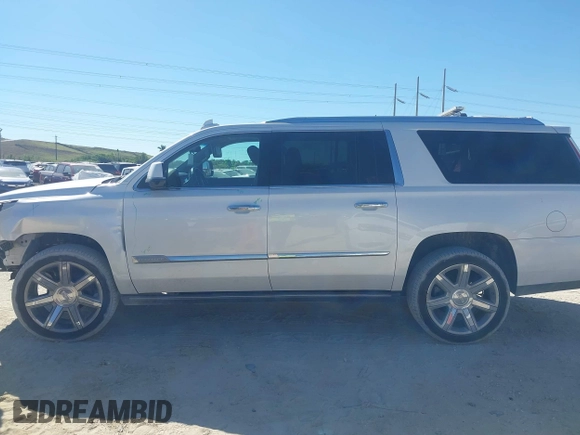 2018 Cadillac Escalade ESV Premium Luxury z VIN 1GYS3JKJ9JR167878, wystawiony jako IAAI lot #41739565 z przebiegiem 158 230 mil mil oraz . Historia ofert i sprzedaży dostępna na DreamBid. Obrazek 14.