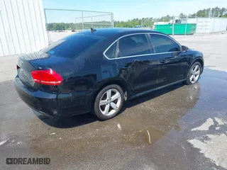 2012 Volkswagen Passat SE with VIN 1VWBP7A3XCC083183, listed as a IAAI auction lot 42011033 with 178,739 mi miles. Bid and sale history available at carsss.com. Image 4.