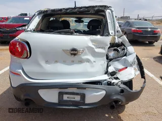 2013 MINI Paceman S ALL4 with VIN WMWSS7C51DWN51802, listed as a IAAI auction lot 41885786 with 96,386 mi miles and . Bid and sale history available at DreamBid. Image 16.
