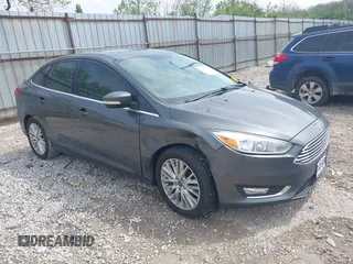 2018 Ford Focus Titanium с VIN 1FADP3J25JL326977, выставлен на аукционе IAAI как лот 42067103 с пробегом 114 753 миль миль и . История ставок и продаж доступна на DreamBid. Изображение 1.