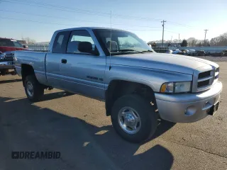 2001 Dodge Ram 2500 with VIN 3B7KF23Z31G821023, listed as a Copart auction lot 82185604 with 77,364 mi miles and Clean Title. Bid and sale history available at carsss.com. Image 4.