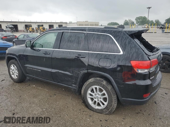 2018 Jeep Grand Cherokee Laredo E with VIN 1C4RJFAG5JC113283, listed as a Copart auction lot 57569595 with 90,897 mi miles and Salvage title. Bid and sale history available at DreamBid. Image 2.