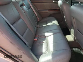 2002 Toyota Camry XLE z VIN 4T1BF32K22U532171, wystawiony jako Copart lot #54527965 z przebiegiem 165 637 mil mil oraz Szkoda całkowita • Salvage title. Historia ofert i sprzedaży dostępna na DreamBid. Obrazek 10.