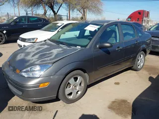 2003 Ford Focus SE with VIN 1FAFP34353W228000, listed as a IAAI auction lot 41682503 with 107,968 mi miles and . Bid and sale history available at carsss.com. Image 17.