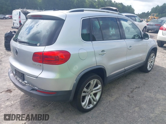2013 Volkswagen Tiguan S with VIN WVGAV3AX9DW566269, listed as a IAAI auction lot 42728301 with 159,903 mi miles and . Bid and sale history available at DreamBid. Image 4.