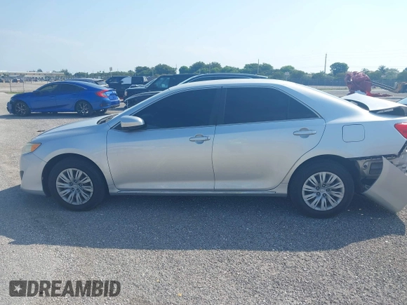 2012 Toyota Camry L z VIN 4T1BF1FK7CU001984, wystawiony jako IAAI lot #41585144 z przebiegiem 20 585 mil mil oraz . Historia ofert i sprzedaży dostępna na DreamBid. Obrazek 14.
