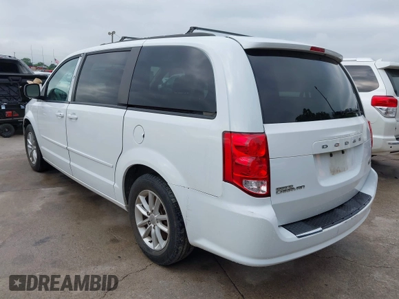 2015 Dodge Grand Caravan SXT with VIN 2C4RDGCG2FR548433, listed as a IAAI auction lot 42121256 with 161,459 mi miles and . Bid and sale history available at DreamBid. Image 3.