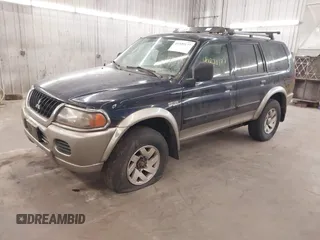 2002 Mitsubishi Montero XLS z VIN JA4MT31R92P011736, wystawiony jako IAAI lot #41920177 z przebiegiem 207 009 mil mil oraz . Historia ofert i sprzedaży dostępna na DreamBid. Obrazek 2.
