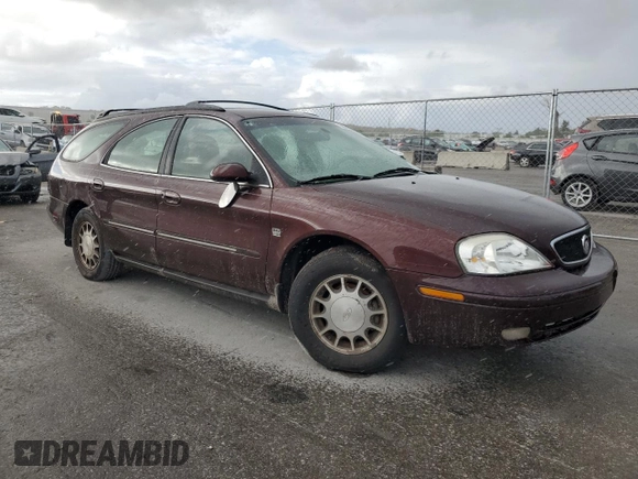2000 Mercury Sable LS Premium z VIN 1MEFM59S1YA600756, wystawiony jako Copart lot #78743334 z przebiegiem 163 595 mil mil oraz Szkody całkowita. Historia ofert i sprzedaży dostępna na DreamBid. Obrazek 4.