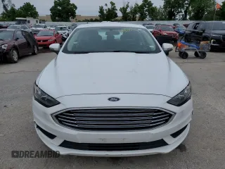 2017 Ford Fusion SE z VIN 3FA6P0HD9HR123410, wystawiony jako Copart lot #59807795 z przebiegiem 131 641 mil mil oraz Czysty tytuł • Clean title. Historia ofert i sprzedaży dostępna na DreamBid. Obrazek 6.