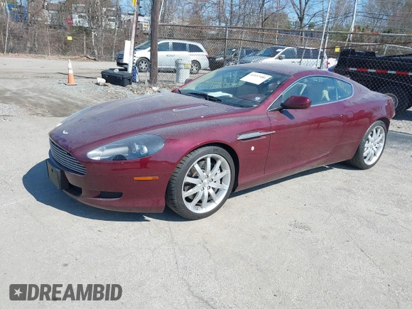 2005 Aston Martin DB9 z VIN SCFAD01A75GA01262, wystawiony jako IAAI lot #41937486 z przebiegiem 35 538 mil mil oraz . Historia ofert i sprzedaży dostępna na DreamBid. Obrazek 17.