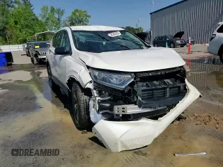 2017 Honda CR-V LX z VIN 2HKRW5H37HH403599, wystawiony jako Copart lot #52382055 z przebiegiem 112 674 mil mil oraz Szkoda całkowita • Salvage title. Historia ofert i sprzedaży dostępna na DreamBid. Obrazek 13.
