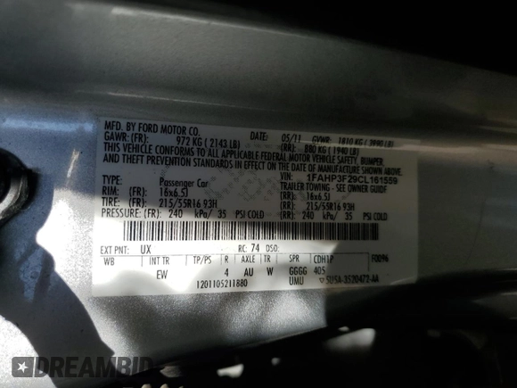 2012 Ford Focus SE with VIN 1FAHP3F29CL161559, listed as a Copart auction lot 61695575 with 127,412 mi miles and Salvage title. Bid and sale history available at DreamBid. Image 12.